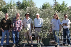 Shane Hayward; Blair Shurtleff, Inventor; Craig Wilson, GGF Farm Manager; Wayne Tyo, Mollie Field, and Barry Johnson, TMHA Division Director.