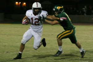 Paso High's Nathaniel Harris moves past a Kingsburg player during the Bearcats' 28-21 overtime victory on Friday night. Photo courtesy of Jennifer Railsback.