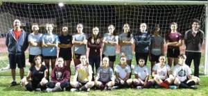 The players on the PRHS girls’ soccer team, pictured with their coaches after conditioning earlier this week, are selling poinsettias to raise funds for their upcoming 2013-14 season.