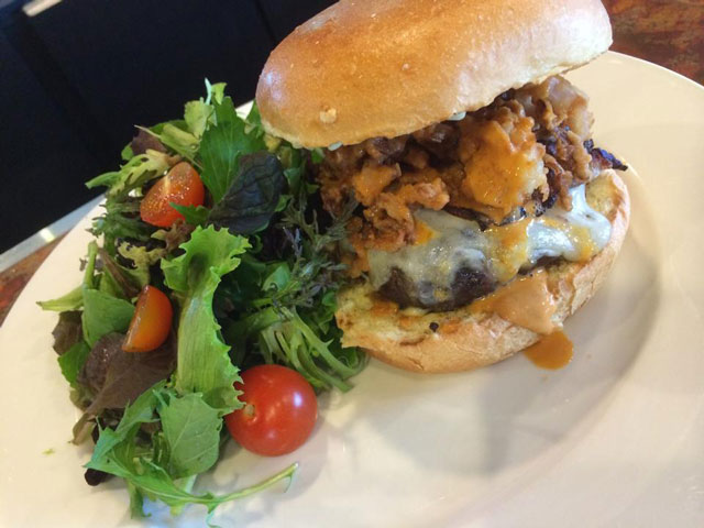 "The Firestarter" is one of the chef's craft burgers: Jack cheese, jalapeño aioli, haystack onions, and ho sauce. be rewarded!!