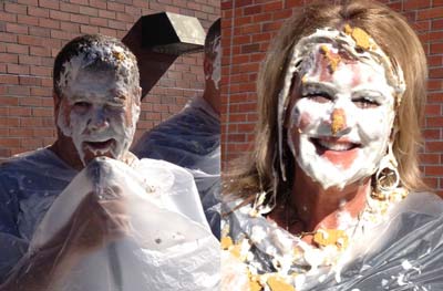 Flamson Principal Gene Miller and Teacher Tammi Barker wearing fresh pie on their faces.