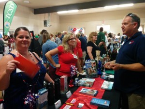 Attendees stop by the Costco booth at last year's business expo.