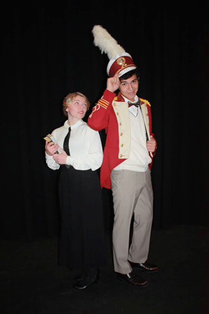 Paso Robles Higth School senior Kassidy Rice, portraying Marion Paroo, and senior Grisey Castro, playing Harold Hill, stand together in costume. Photo courtesy of Marcy Goodnow
