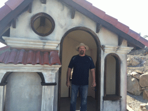 Ben Polando stands in the Tuscan-style play house that will accomodate chldren with disabilities, including those in wheelchairs. Photo by Heather Young