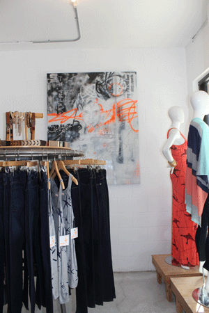 This is the second painting by Adam Welch in Farron Elizabeth clothing store. Photo by Heather Young