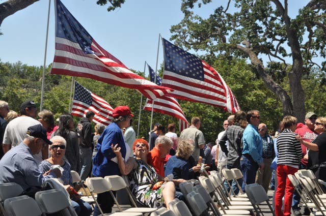The crowd enjoys refreshments following the ceremony.