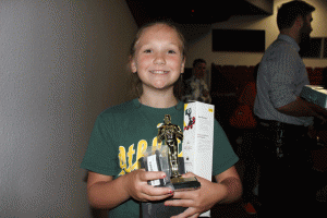 Kermit King Elementary School fourth grader Kennedy Williams holds her trophy and prizes for winning Best Smartphone Produced film in the Paso Robles High School Potent Film Festival. Photo by Heather Young