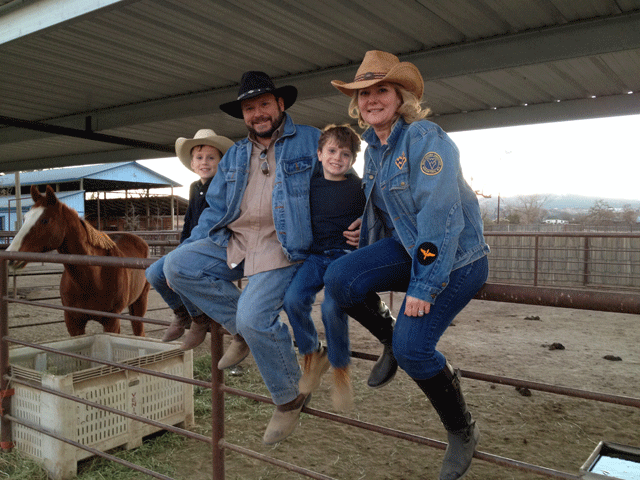 Pamela Sharp with her husband, Rob, and their two sons.