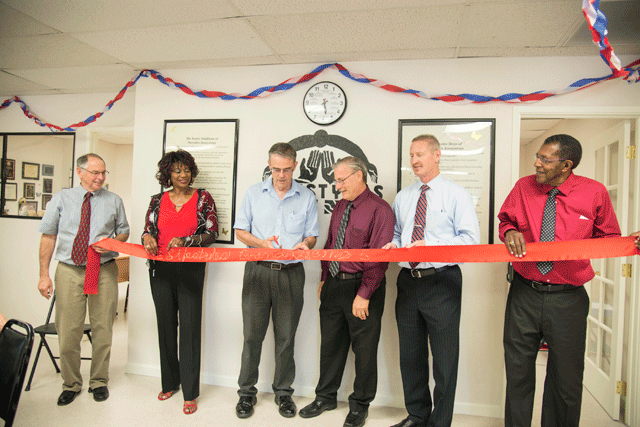 From left, Lifestyles Recovery Center, Inc. Board Member Chris Iversen, Executive Director Karolyn London, Paso Robles Mayor Steve Martin, Board President Mark Rehfield, Board Member Paul Press and Chief Financial Officer Eddie London cut the ribbon on the nonprofit's new location in Paso Robles on Monday. Photo by Heather Young