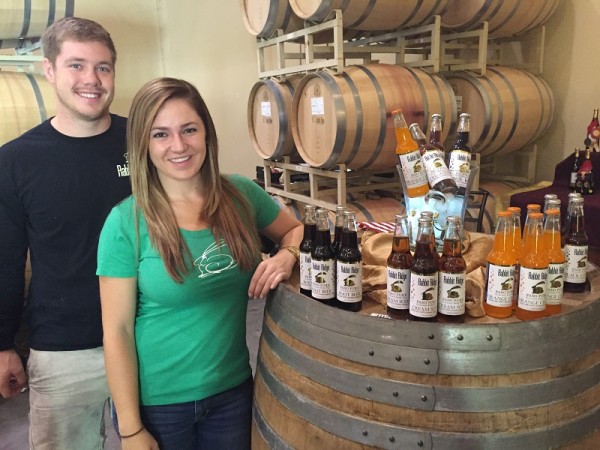 Brice Garrett and Sarah Fleming are selling Paso Pure craft sodas, a Rabbit Ridge Winery product. Photo by Paula McCambridge
