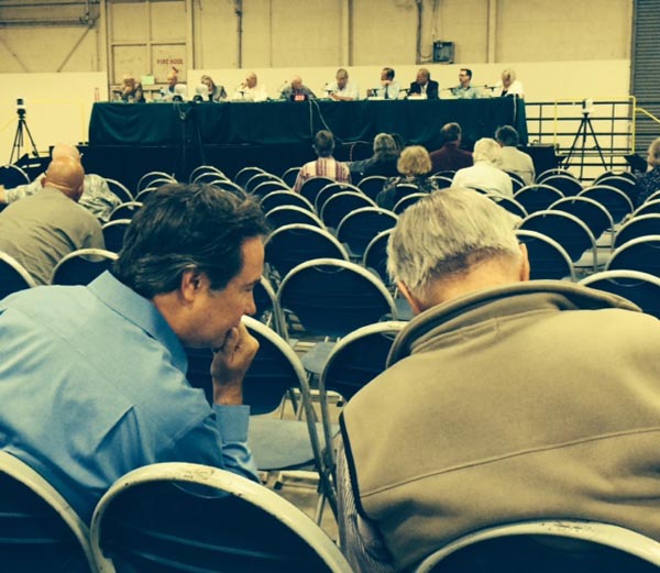 Steve and Jerry Lohr confer as the LAFCO hearing begins it's 5th hour. Crowds began to thin as the night went on.