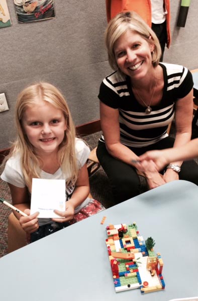 6-year-old Avery Luzi with Children's Librarian Heather Stephenson. Photos by Dick Mason.