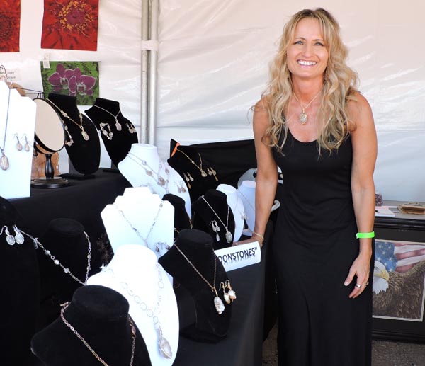 Julie Parker finds natural stones from beach walks in Cambria, tumbles them, and then wire wraps them into pieces of wearable art.