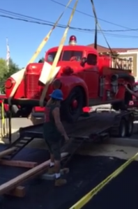 Workers install the new exhibit at the Children's Museum.