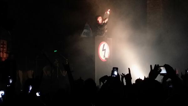 Manson burned a bible at a Hitler-esque lectern.