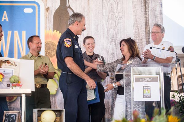 Fifth District Supervisor Debbie Arnold congratulates Fire Chief Robert Lewin at the opening of Sunset Savor weekend. Courtesy photo.