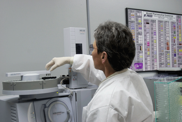A Forensic Laboratory A A San Luis Obispo County Sheriff's crime lab specialist uses a Gas Chromatographer-Mass Spectrometer to analyze samples