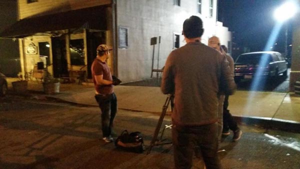 Camera men on the scene of Amy Allen's 'walkthrough' of the saloon.