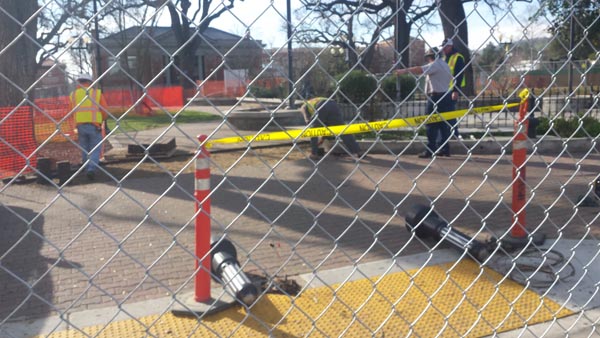 Construction crews are beginning to lift the brick pavers near the park's entryway.