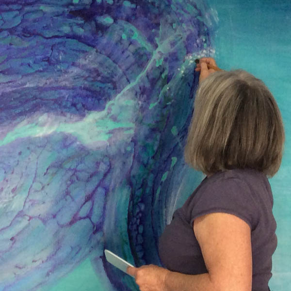 Member Carlota Santa Cruz working on a piece for the show.