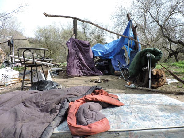 One of the estimated 40 homeless encampments in the riverbed. Photography by DuPree Dial.