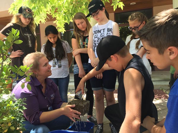 Christy Gabler teaching about permeable concrete.