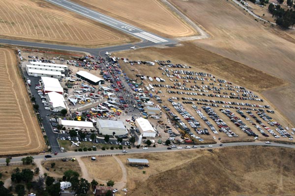 An aerial view of this year’s Warbirds Wings and Wheels 8 show on Dry Creek Road where 4,000 people attended. (Steve Lochan photo).