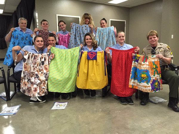 Inmates involved with the Women's Honor Farm Sewing Program along with the Program's Coordinator Senior Correctional Deputy Lisa Piotrowski.