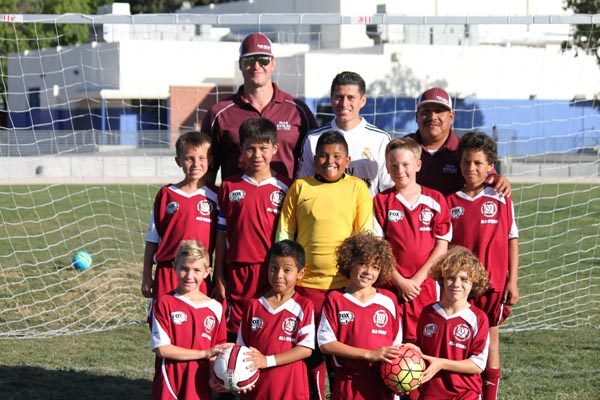 Players and Coaches shown in order from left to right. Front row: Carson Schoenbeck, Kiki Lara, Adam Pfarr, Nic Woodard. Middle Row: Matt Graebner, Izayah Campoverde, Jayden Ruiz, Jake Simpson, Deon Bridewell. Back Row: Coaches Paul Graebner, Rudy Jaimes, and Tony Ruiz.