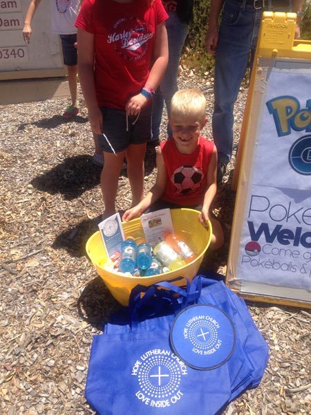 Pastors Liz and Ryan put their heads together and decided to put a sign out in front of Hope Lutheran Church letting others know that they were a Pokestop point. "We offer Gatorade, juice boxes, water, snacks, and even sunscreen to other players as they search out Pokemons, especially in this hot weather."