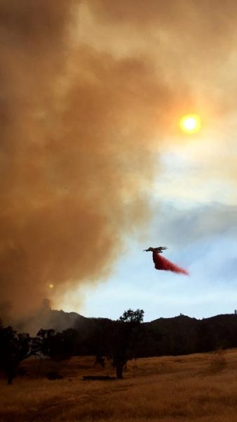 Cal Fire tanker drops fire retardant near Running Deer
