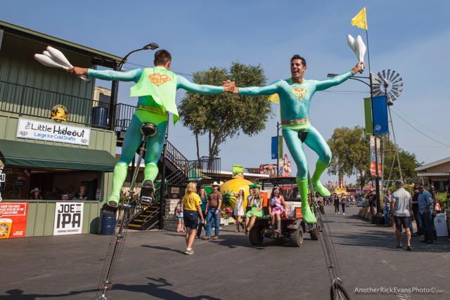 Crowds of visitors packed the fair in spite of the heat. Photo by Rick Evans.
