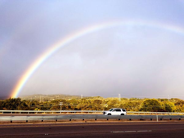 A rainbow links Paso Robles and Atascadero. Photo by Jordan Elgrably.