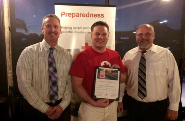 From left: Director of Student Services Paul Press, Disaster Program Manager for the Red Cross Ryan McMahon, School Safety Officer Jason Taylor.