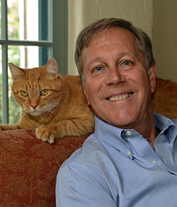 The poet with his favorite cat (photo Star Black).