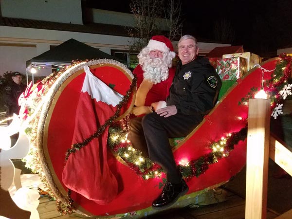 Santa and Paso Robles Police Chief Robert Burton.
