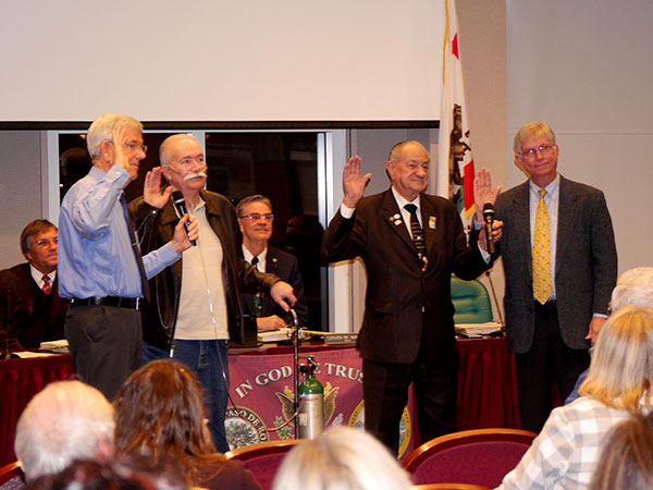 Dennis Fansler, Michael Compton, Fred Strong and Steve Gregory get sworn in (photos Jordan Elgrably).