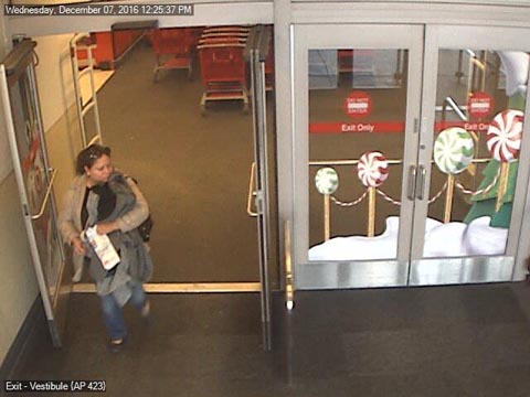 The woman in the video appears to be a Hispanic female, 30-40 years of age, with brown medium length hair.