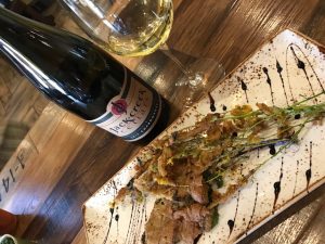 Tempura batter-fried mustard flowers with Jack Creek Cellars chardonnay