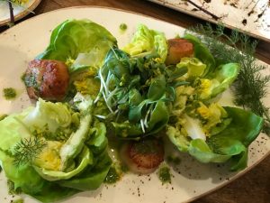 Scallop salad with chimichuri sauce made from wild plantain leaves