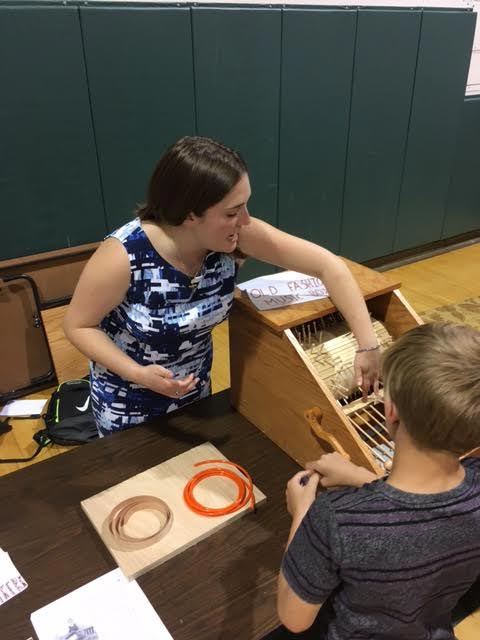 Sarah Reitkerk and a music box she built.