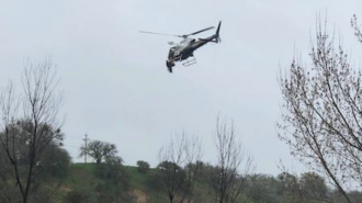 Helicopter rescue flooded riverbed paso robles