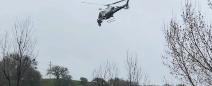 Helicopter rescue flooded riverbed paso robles