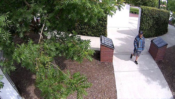 Police searching for man who they say stole from Faces of Freedom memorial