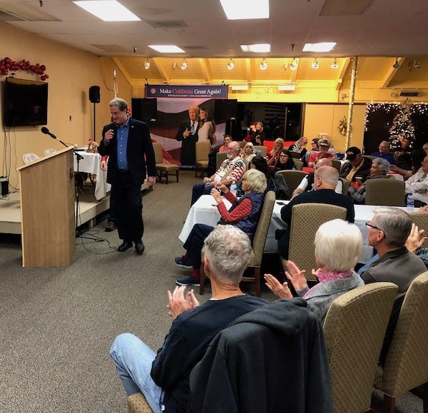 Congressional candidate speaks at the Republican Party annual holiday meeting