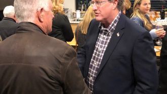 Election Caldwell shaking hands