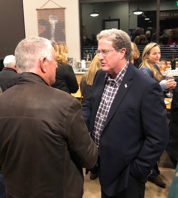 Election Caldwell shaking hands