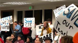 Student protesting placards