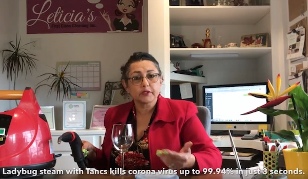 Local business owner demonstrates how to disinfect with confidence
