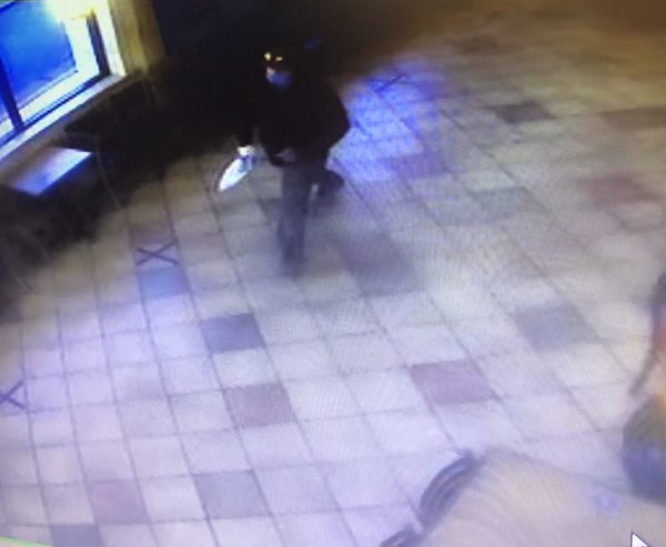 The suspect is described as white male adult wearing a mask, brown and yellow flannel shirt and blue jeans.